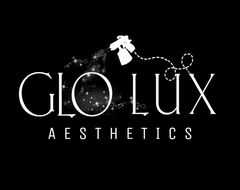 GLO LUX Aesthetics logo in white on black, with a stylized perfume bottle and dotted sparkles.