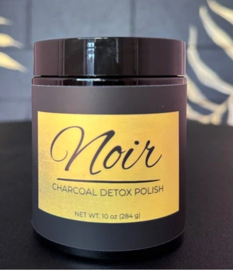 Black jar labeled 