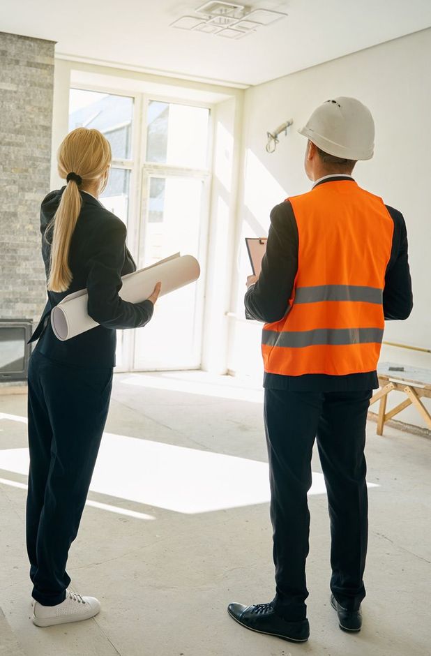 Client And Worker Checking The House