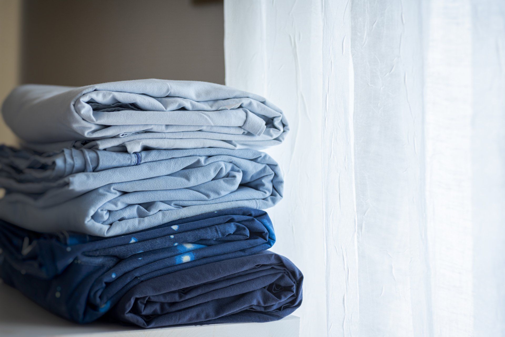 White Pillow and Comforter — Morehead City, NC — Sunshine Cleaners & Laundry White Pillow and Comforter — Morehead City, NC — Sunshine Cleaners & Laundry