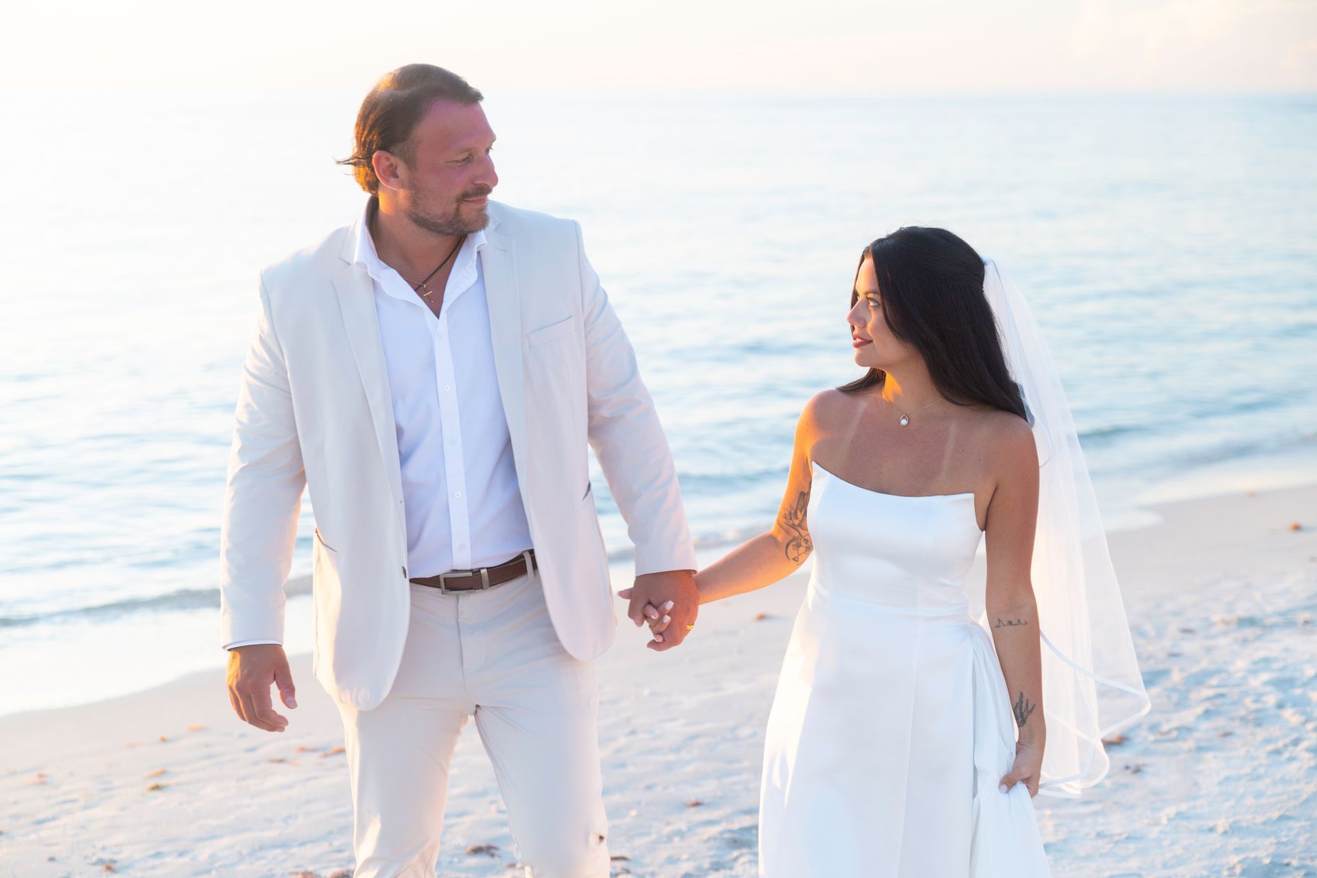 Couple sharing first dance at a candlelit Charleston venue reception
