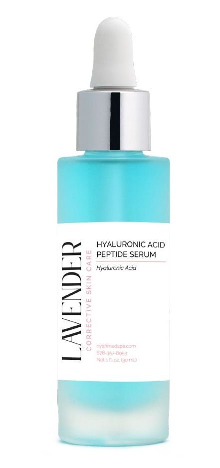 Lavender serum bottle with dropper, white label, and turquoise liquid inside