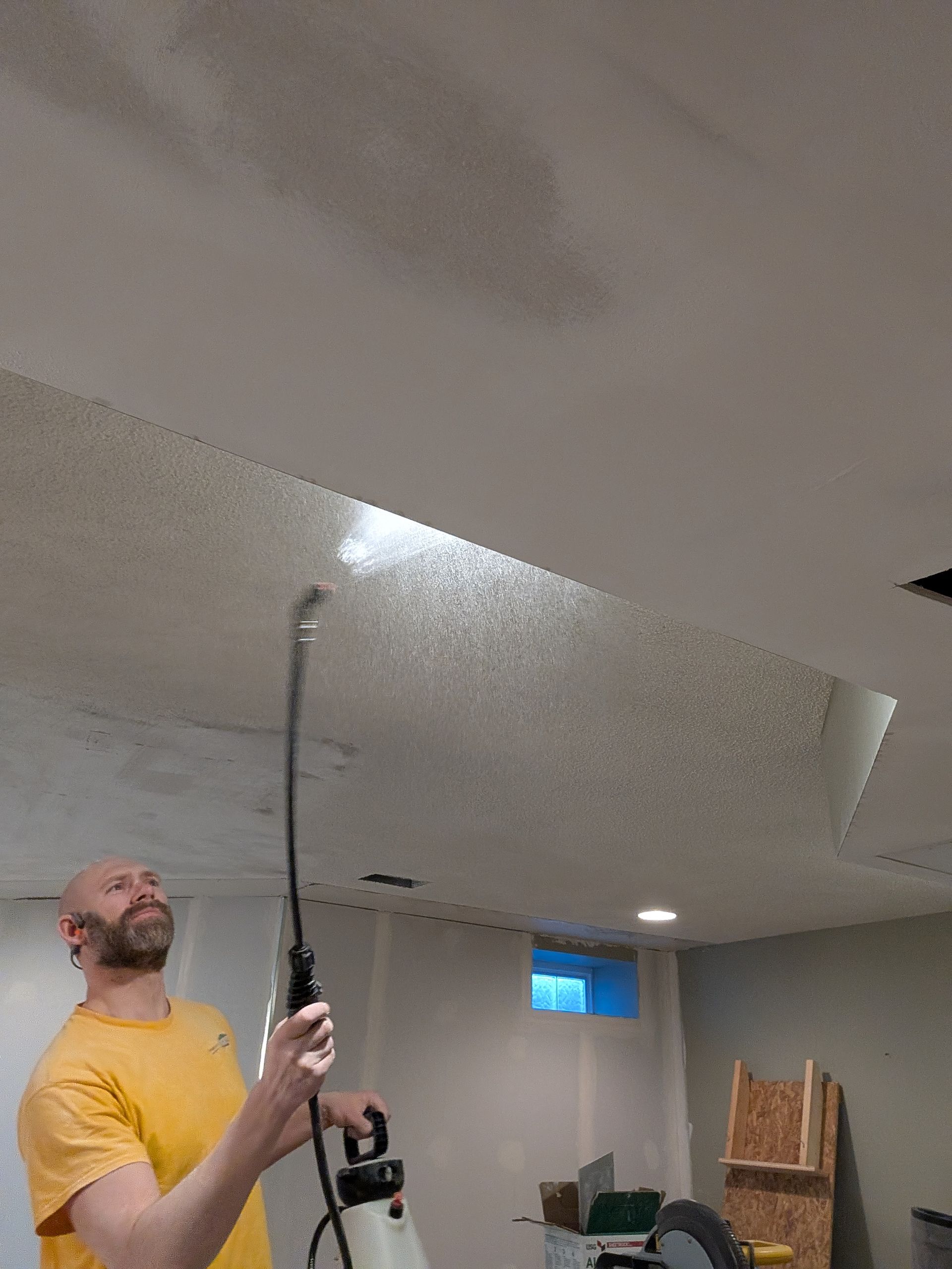 soak the popcorn ceiling before removal