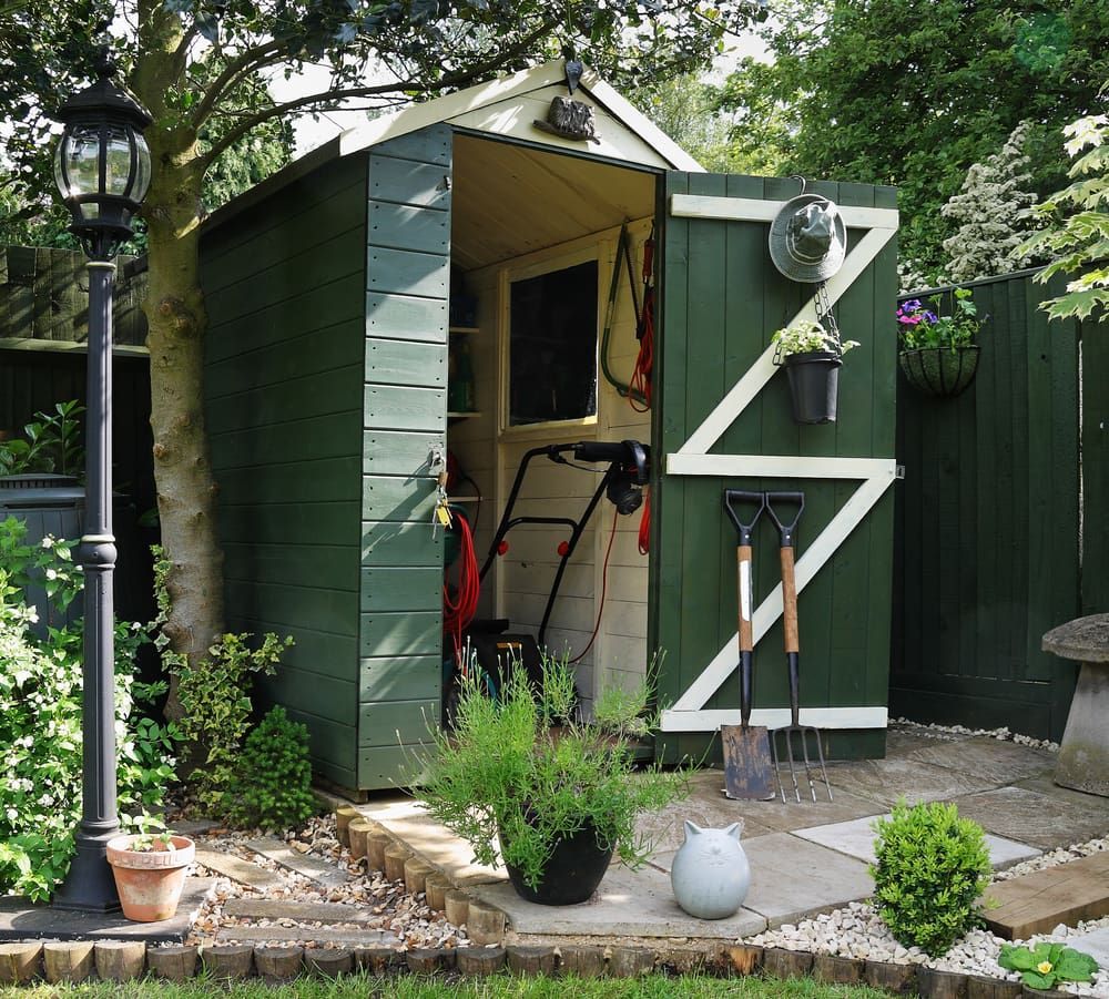 A Green Shed with A White Z on The Door — JWB Joinery in Aitkenvale, QLD