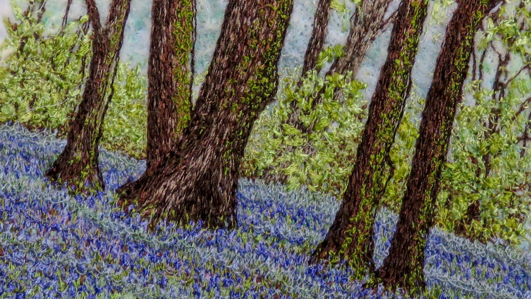 close up of blue bell wood embroidery by claire fell