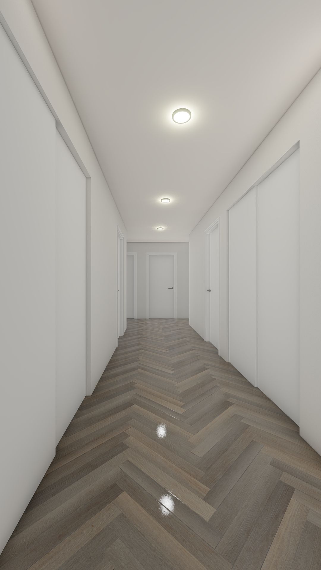 A long hallway with a herringbone floor and white walls.
