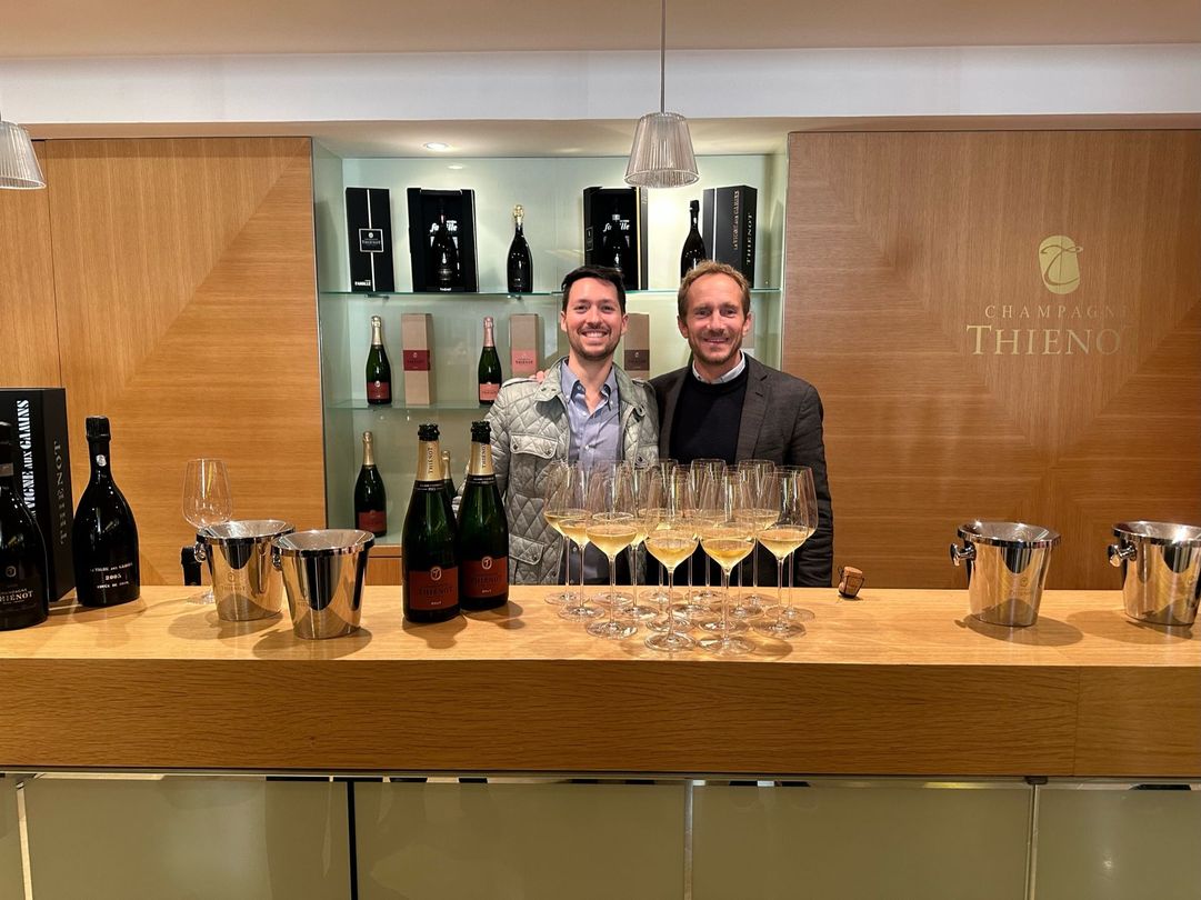 Raymond James Irwin and the owner of a Champagne House at a tasting in Champagne, France.