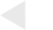 Light gray left-pointing triangle on a white background