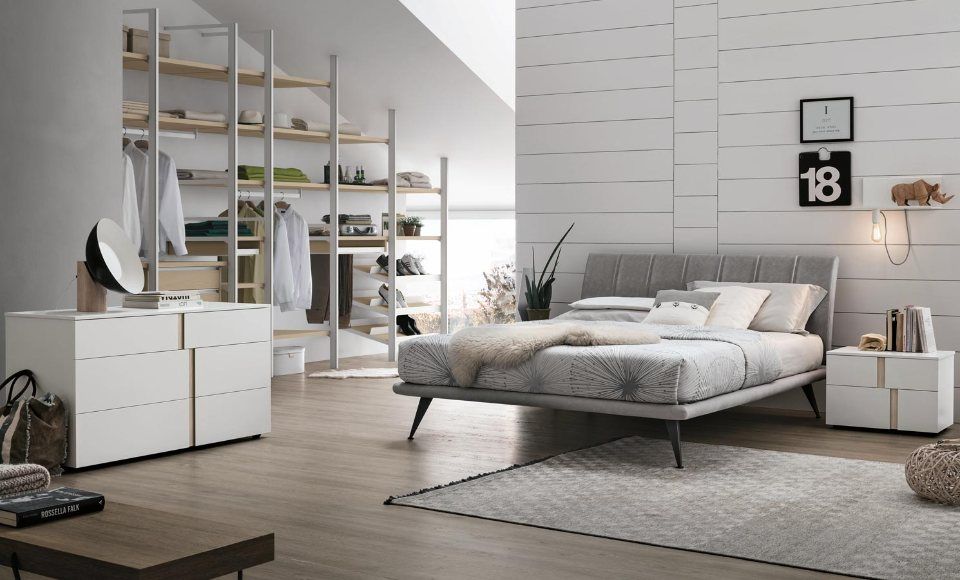 camera da letto dallo stile moderno in showroom