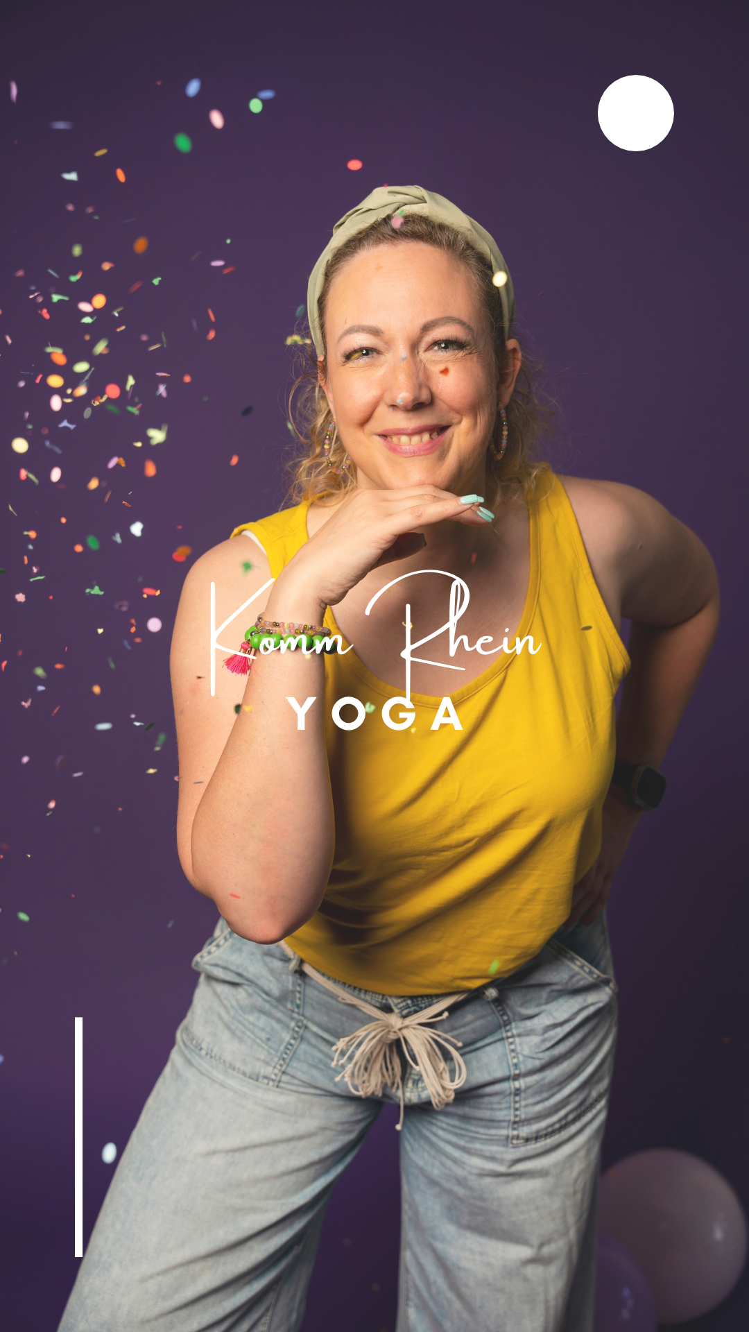 Woman in yellow tank top and jeans smiles, hand to chin, against a purple confetti backdrop.