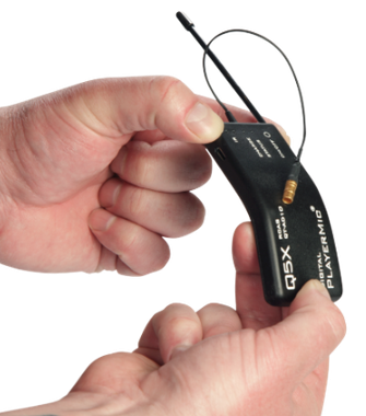 Hands bending a Q5X PlayerMic displaying its flexible rubber housing for player and talent safety