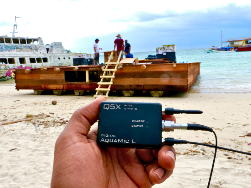 Q5X AquaMic L in sound mixer's hand on the set of Mr Beast's 7 Days Stranded at Sea video