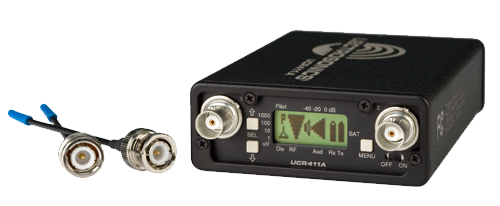 Front view of Lectrosonics UCR411A reciever next to a pair of BNC antennas