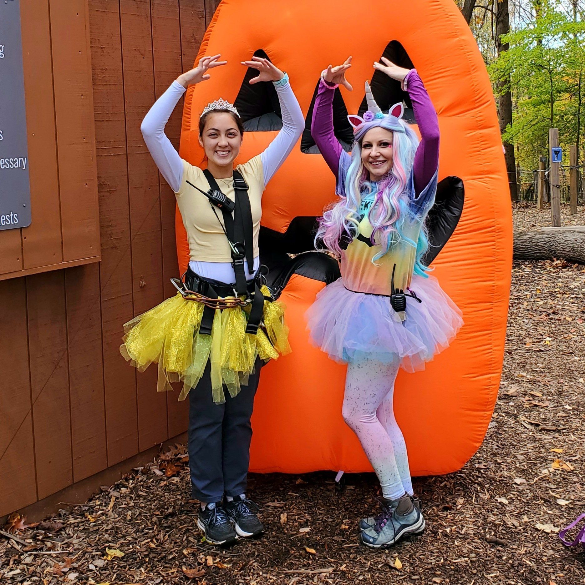 2 females dressed up for Halloween in tutus
