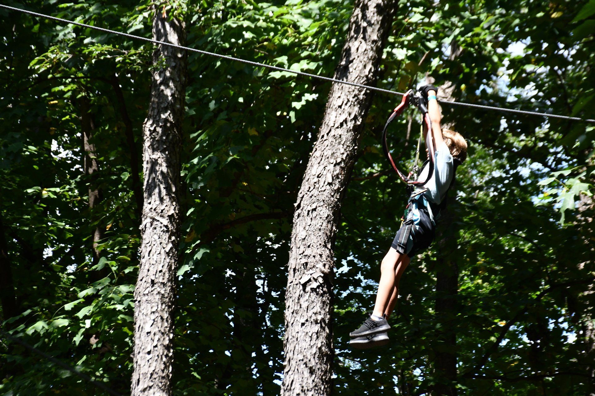 Climber at ropes course