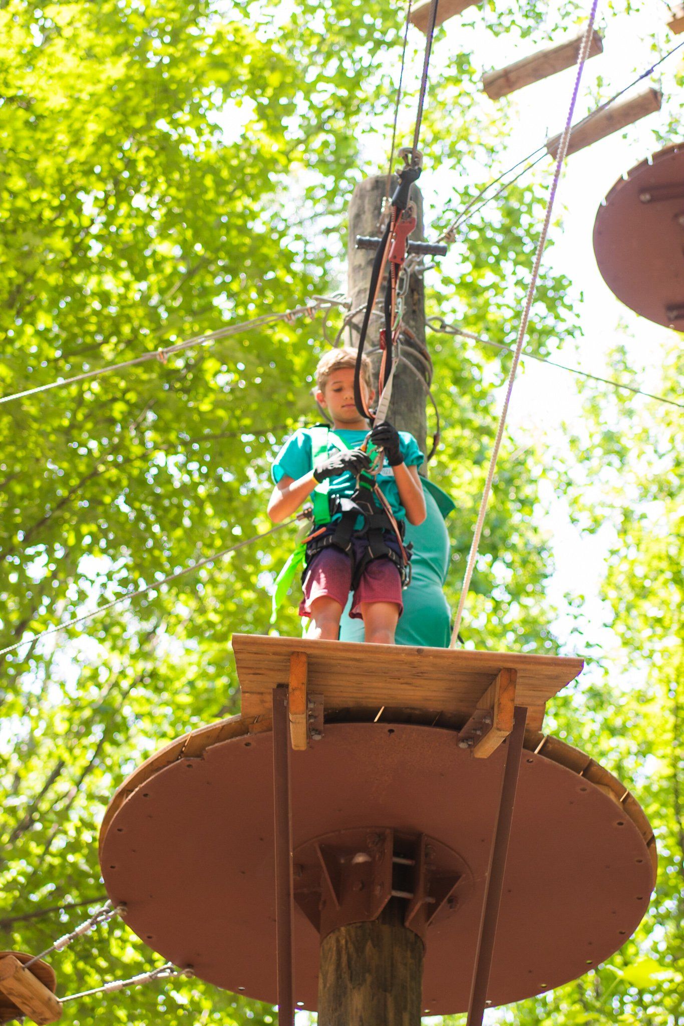 Young female climber getting ready to take a leap of faith
