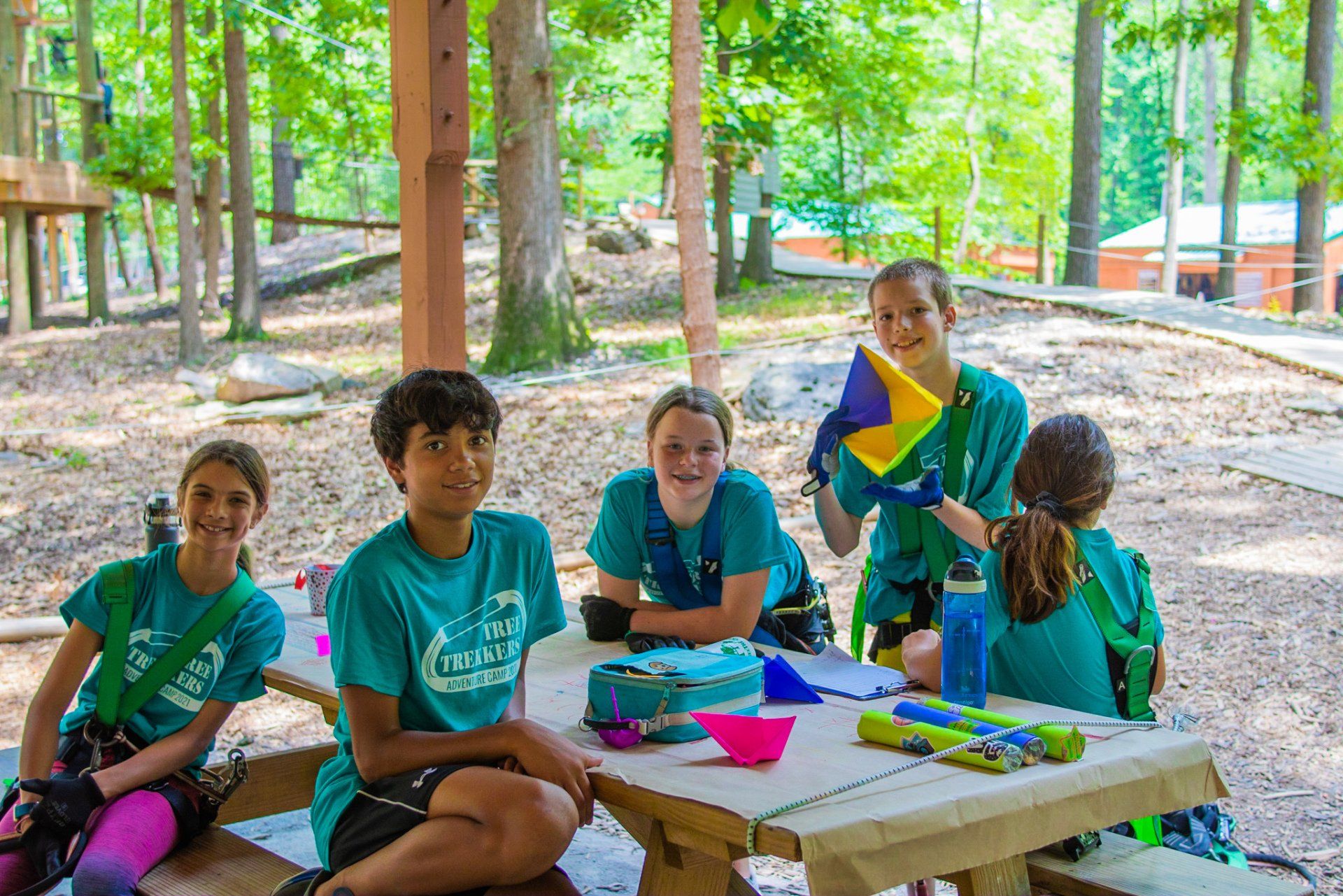 Adolescent youth doing crafts in picnic pavilion