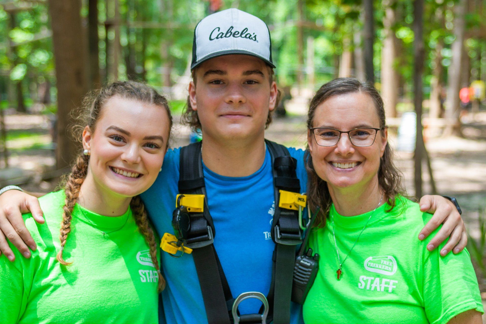 A family of staff enjoying their job at Tree Trekkers