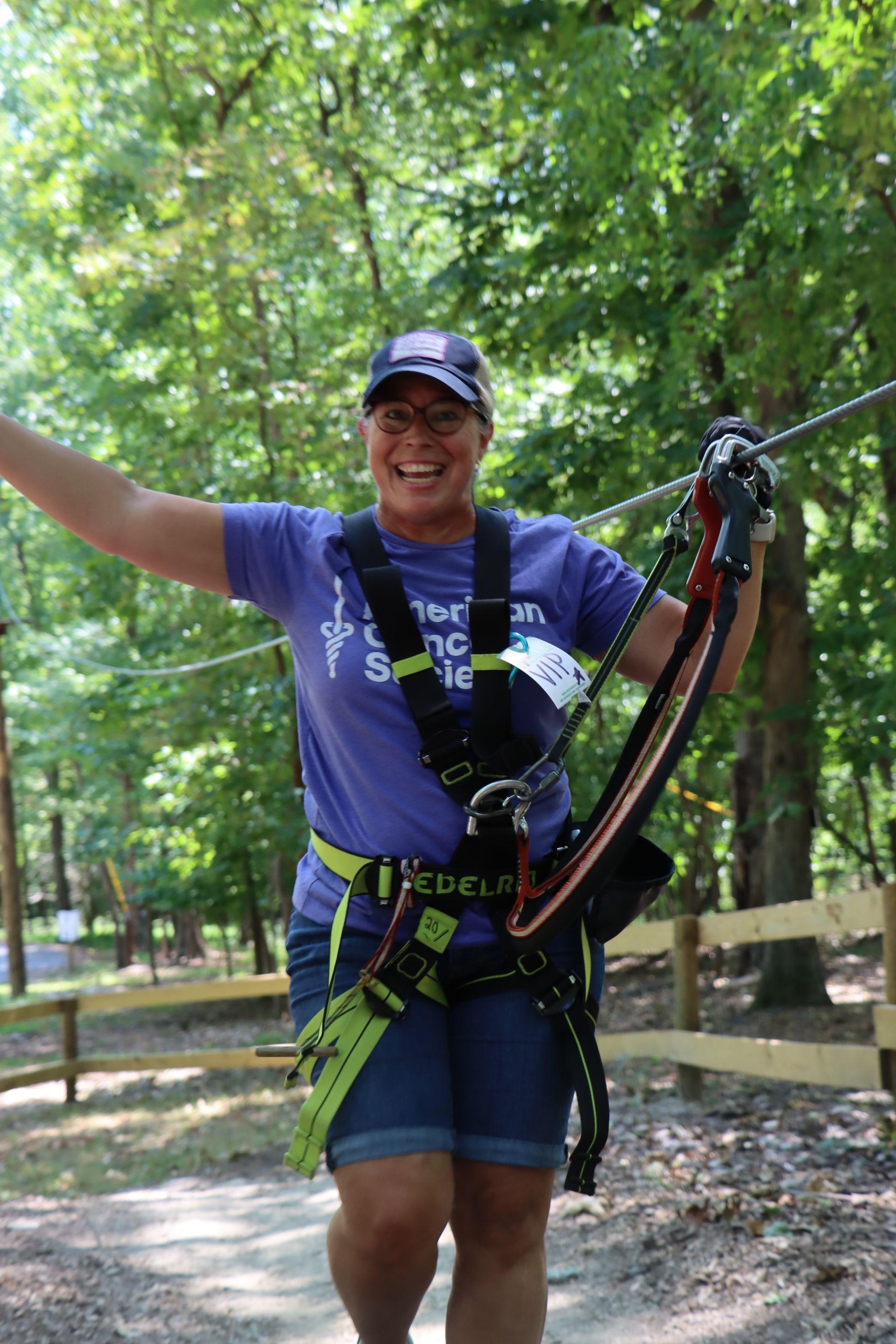 women celebrating on ropes course at Tree Trekkers