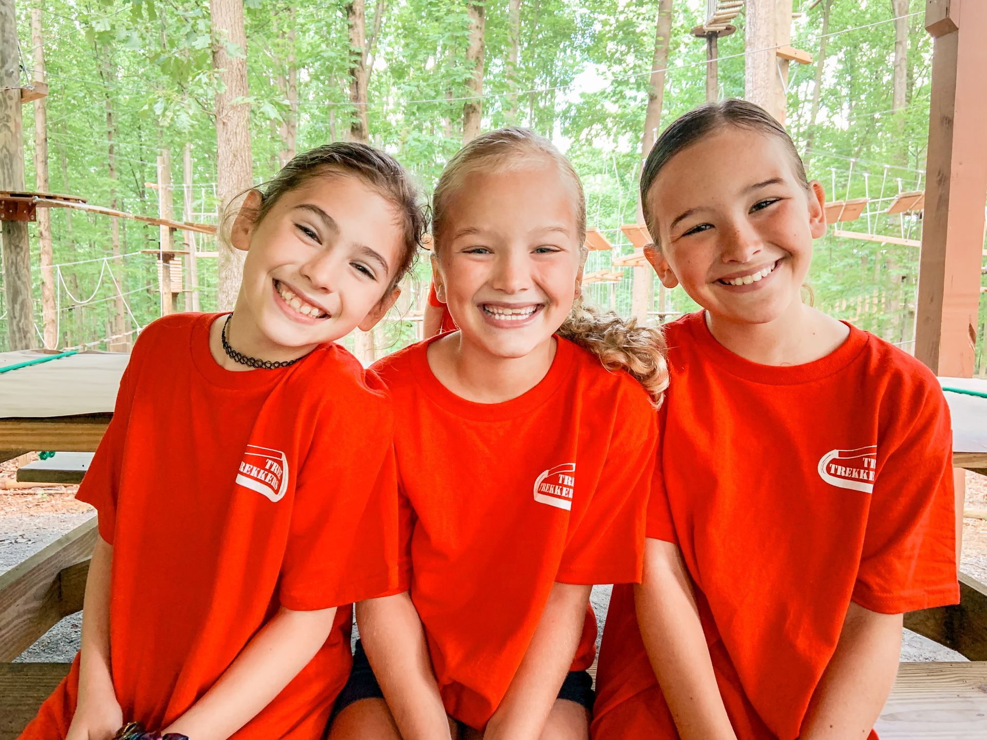 Female campers enjoying picnic pavilion at summer camp