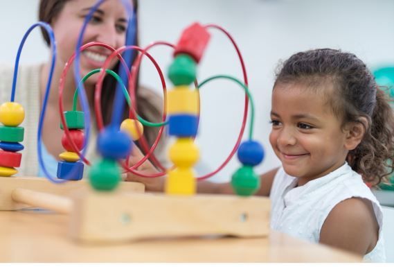 Aba Therapist Teaching kid