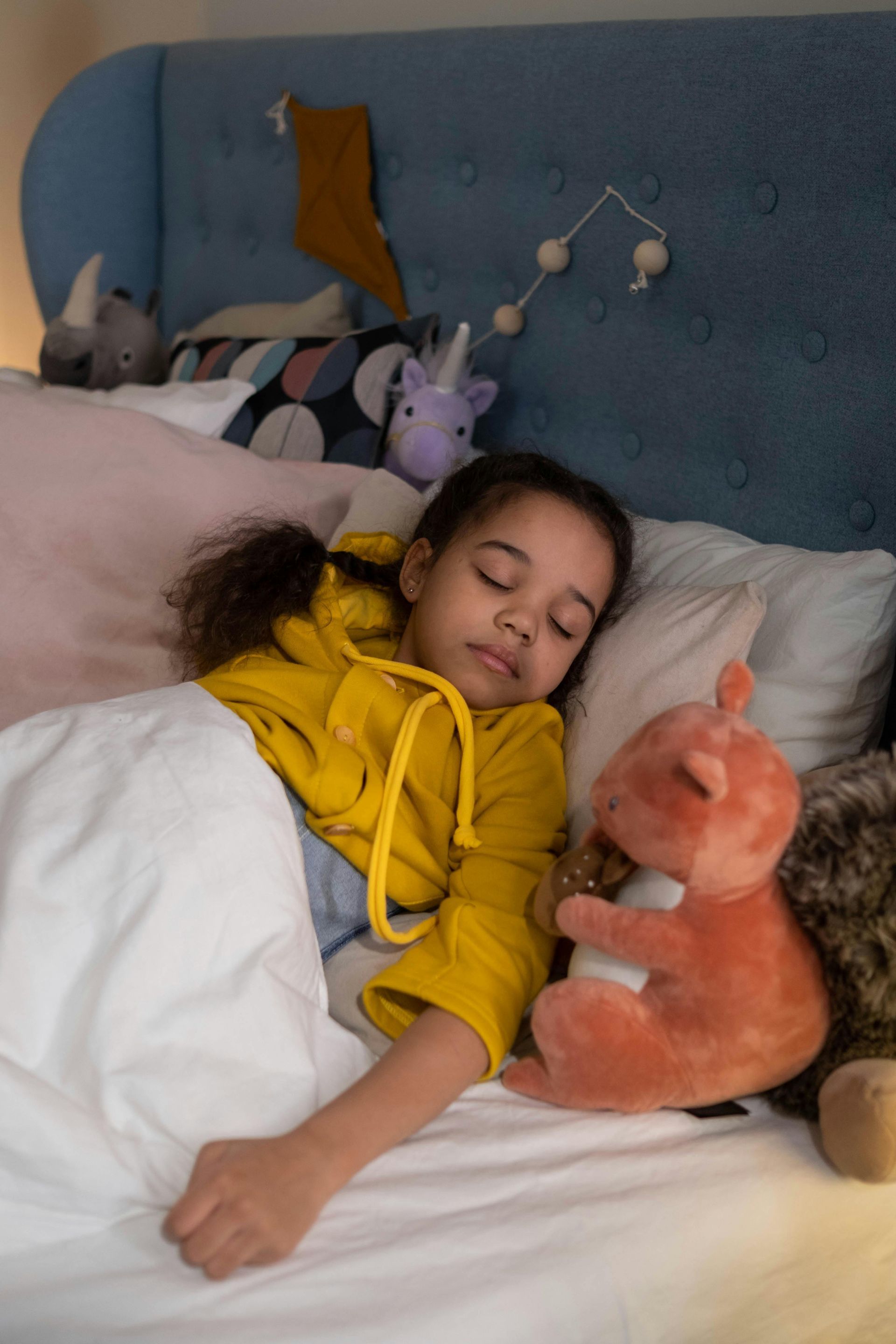 Child sleeping in bed - ABA therapy for autism