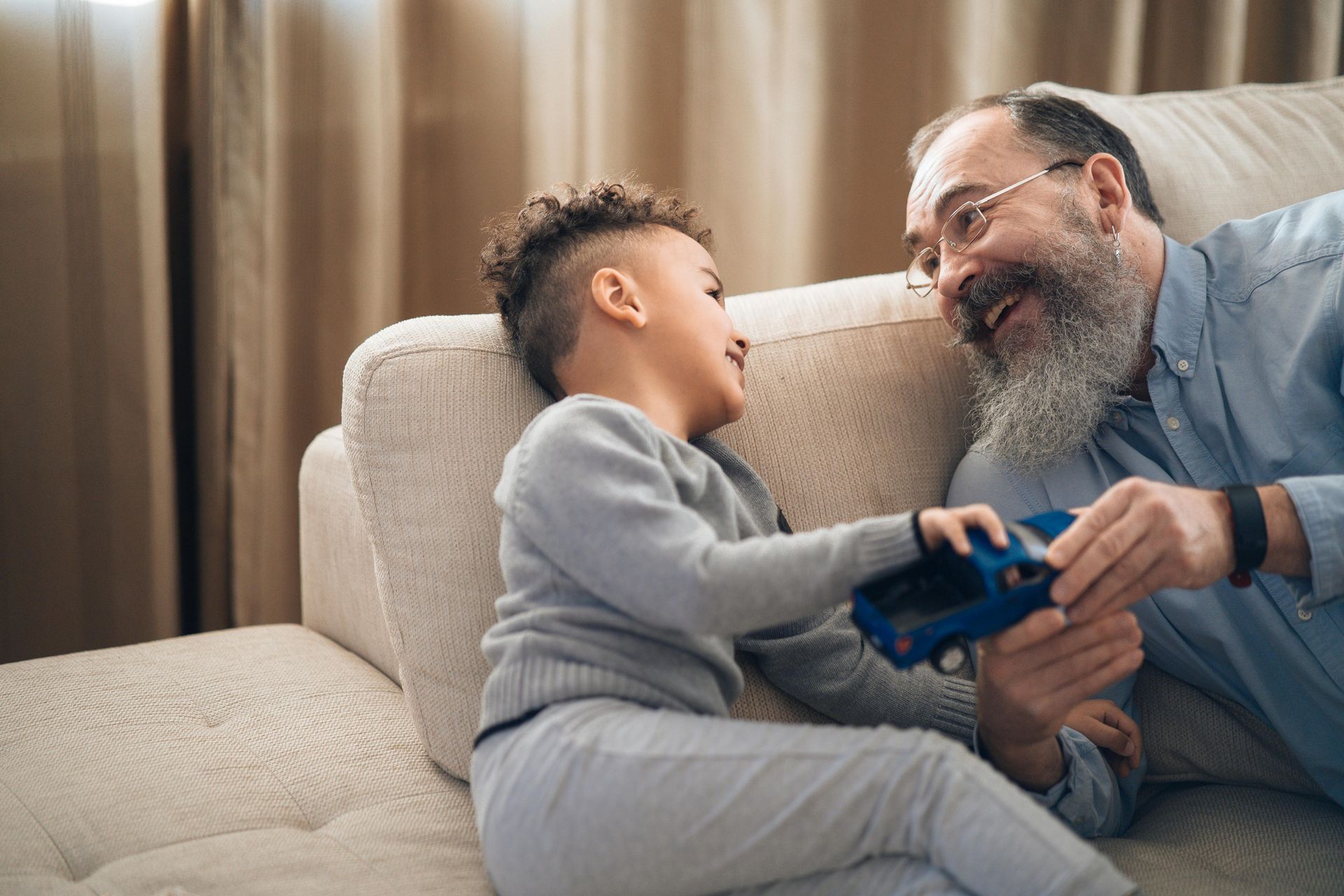Adult talking with child - ABA Therapy