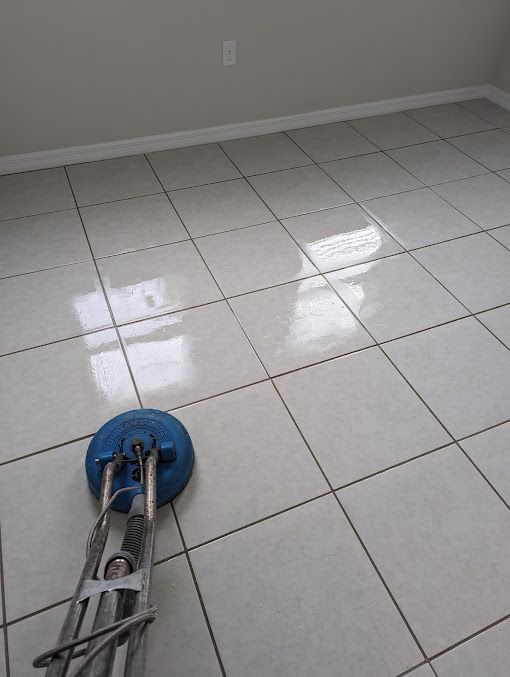Steam cleaning tile floor with high pressure equipment during deep tile and grout cleaning service