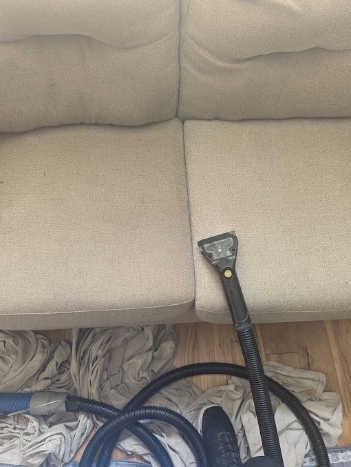 Upholstery cleaning service on fabric sofa cushion showing stain removal results
