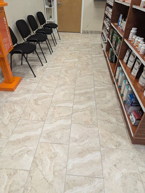 Shiny tile floor in retail store after professional tile and grout cleaning services
