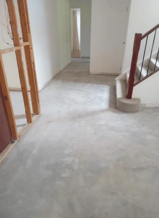 A Hallway with Stairs in A House Under Construction — TNT Floor Removal & Demolition in Tewantin, QLD