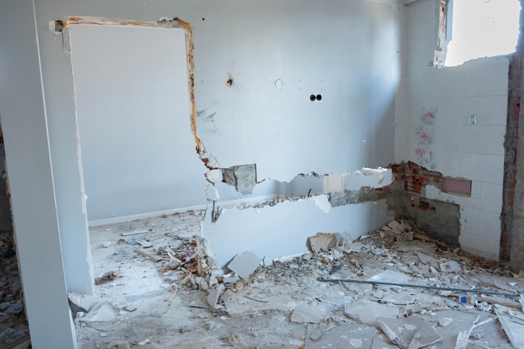 There Is a Hole in The Wall in The Middle of The Room — TNT Floor Removal & Demolition in Tewantin, QLD