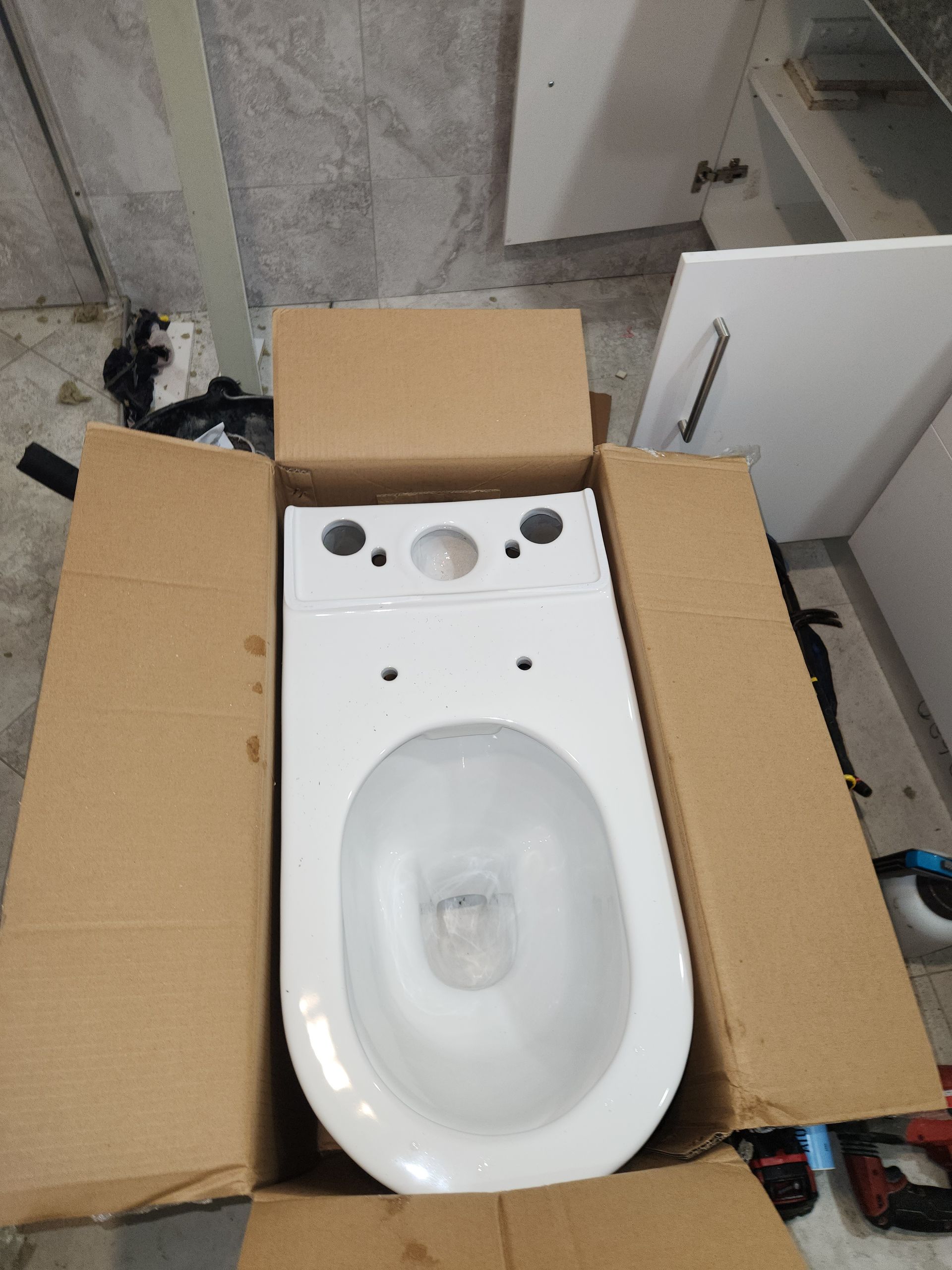 A Double Bathroom Vanity Under Construction With Sinks Installed — Kingdom Plumbing Services in Gordonvale, QLD