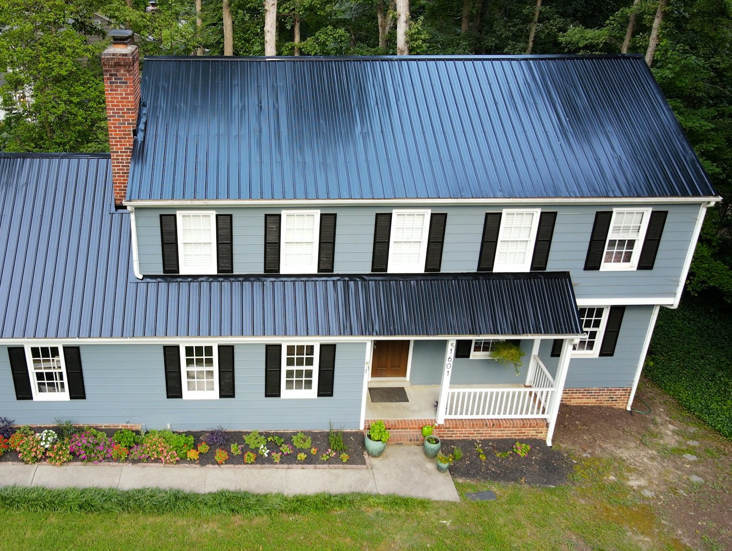 What a beautiful ribbed metal roof, right?! A Retex-installed ribbed metal roof on a home in North Chesterfield, VA 23235.