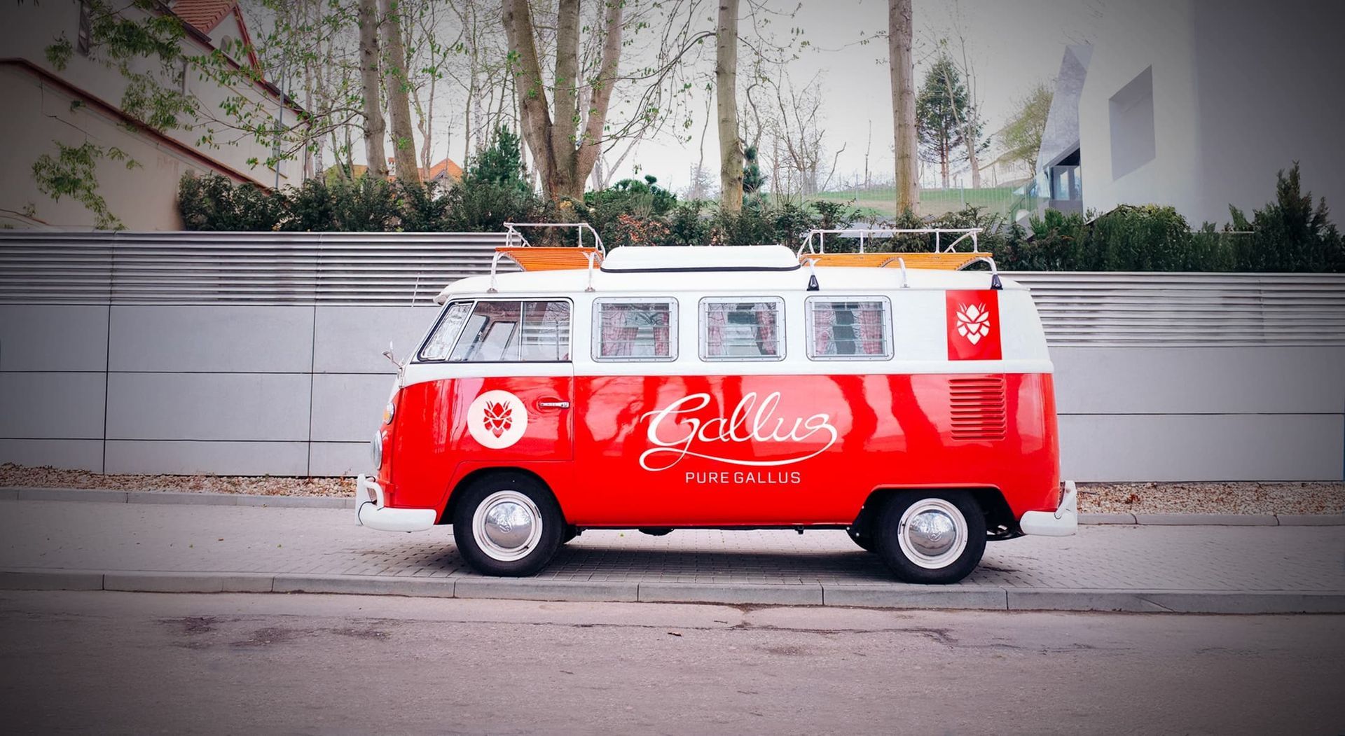 Red and white vintage VW bus with