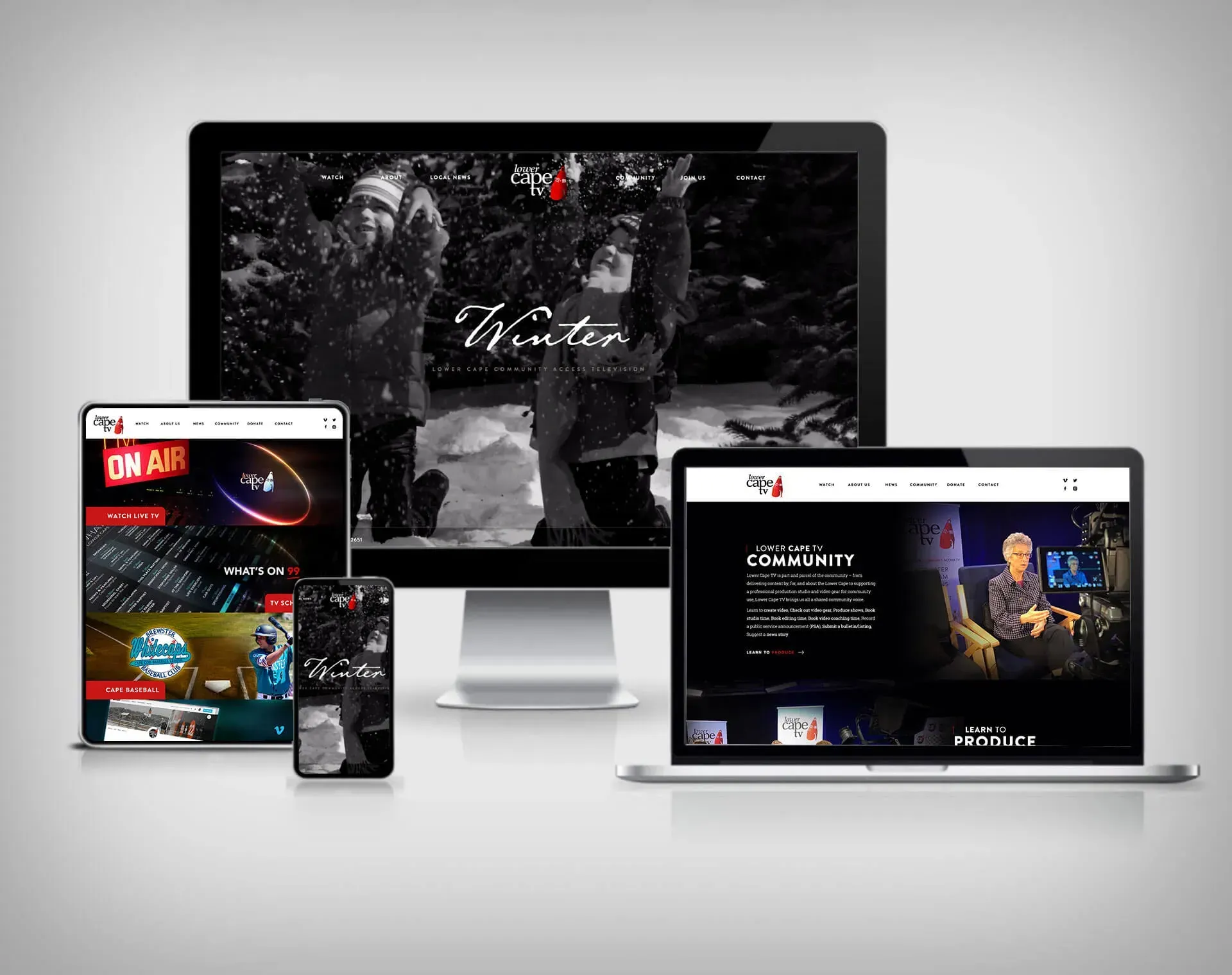 Website displayed on desktop, laptop, tablet, and phone screens; black and white winter theme.