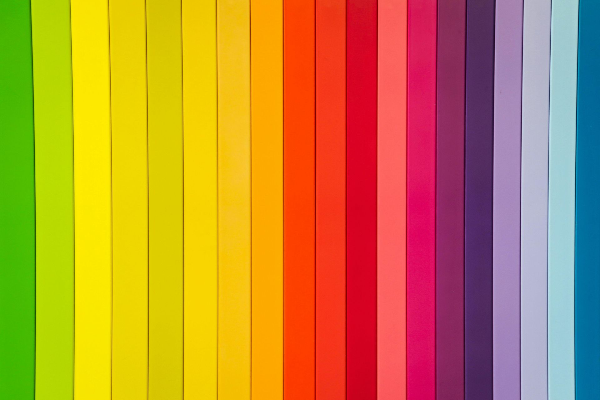Vertical stripes of various colors arranged in a rainbow spectrum.