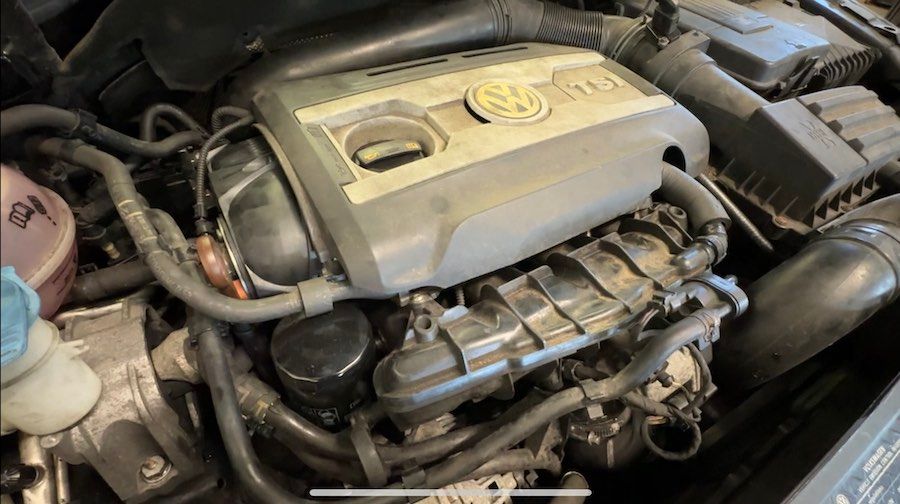 A close up of the engine of a car.