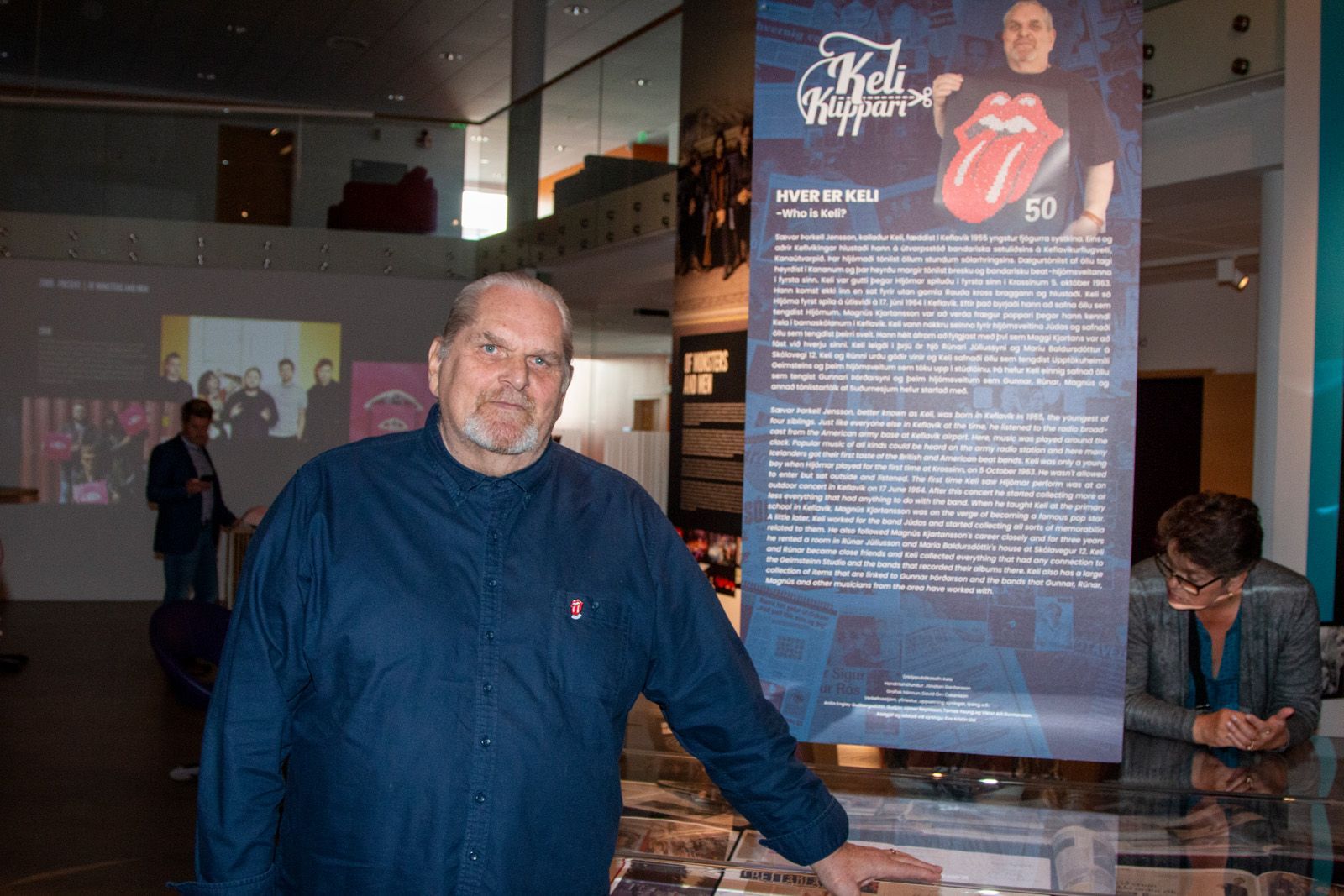 Keli Klippari standing beside his exhibition at the Icelandic Museum of Rock ’n’ Roll.