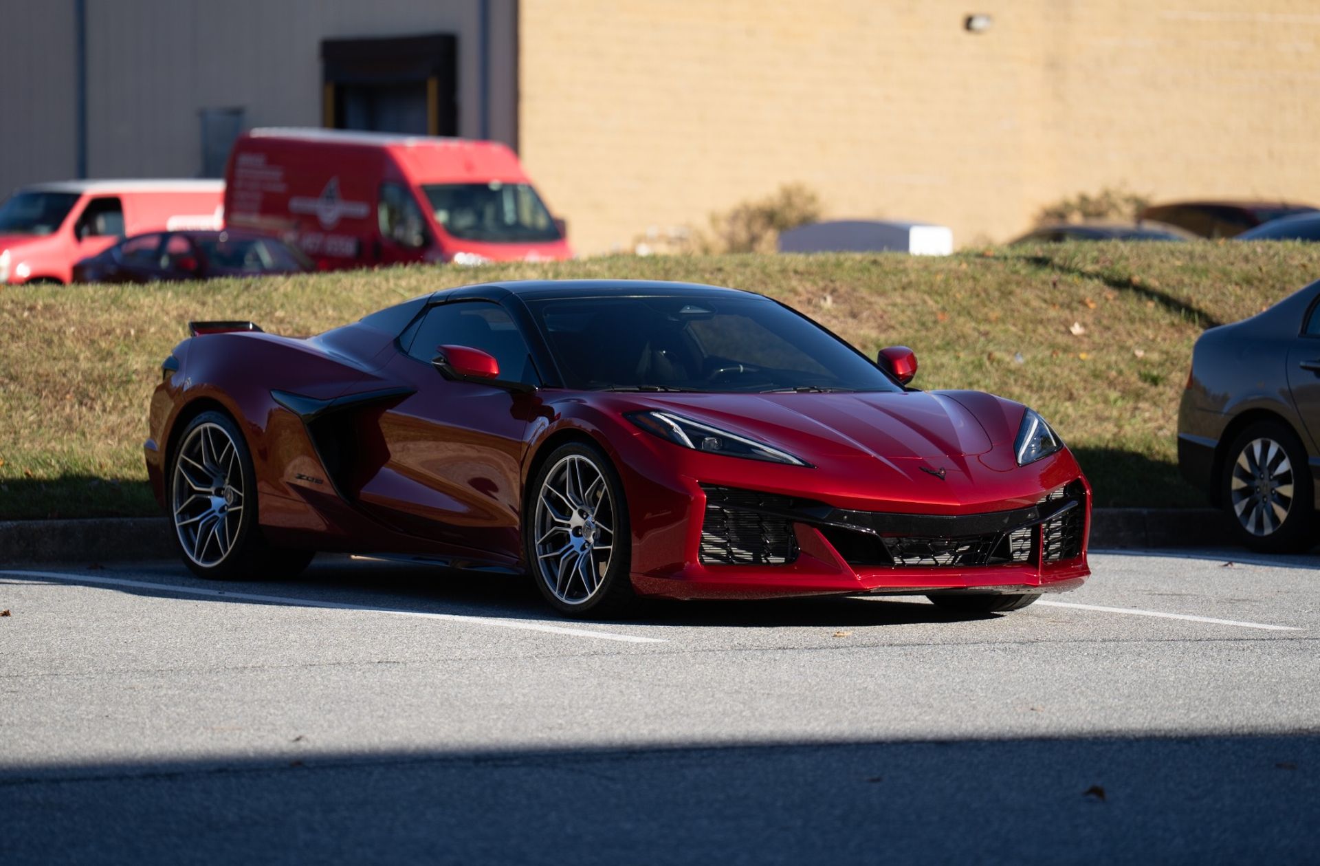 Red Corvette with PPF protection in parking lot