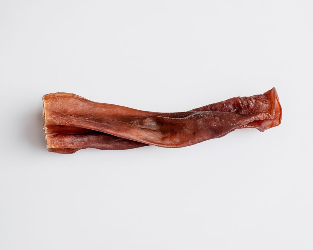 A Close Up Of A Piece Of Meat On A White Surface — Cessnock Pet & Greyhound Supplies in Maitland, NSW
