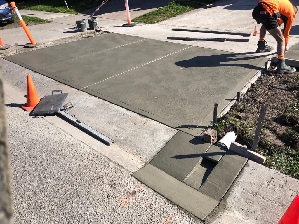 A concrete on the side of a road.