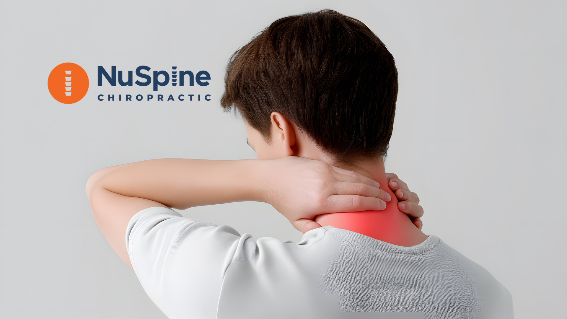 Man holding shoulders, pain highlighted, NuSpine Chiropractic logo in background.