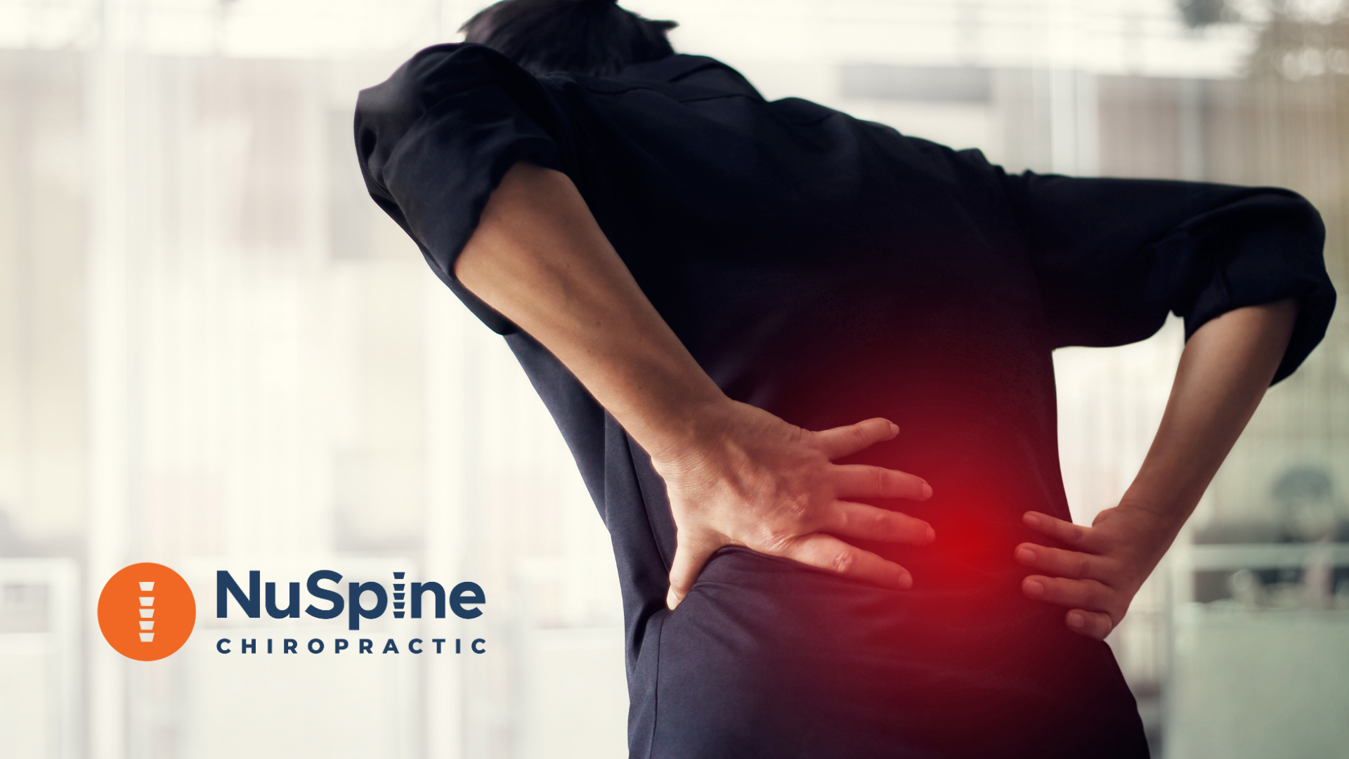 Person holding their lower back in pain; red glow highlights the affected area, NuSpine Chiropractic logo.