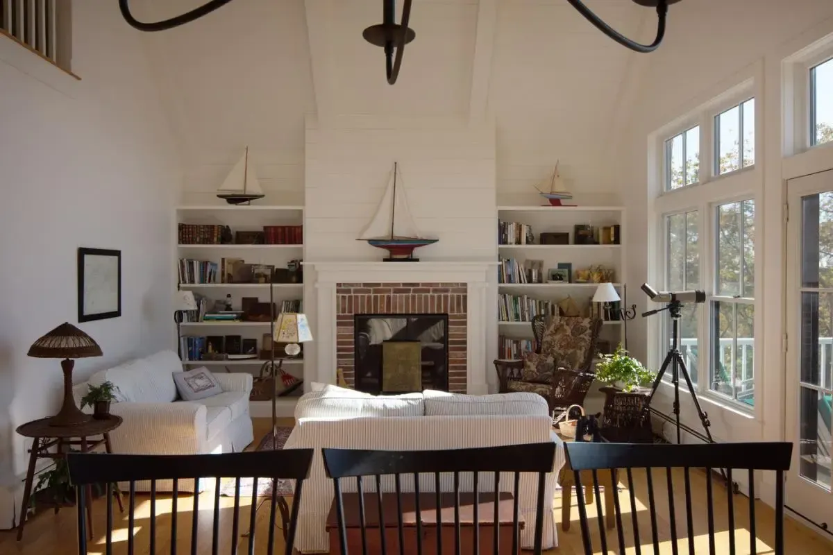 A living room filled with furniture and a fireplace
