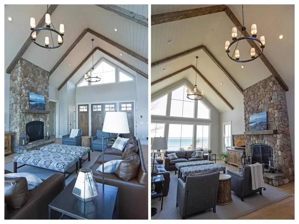 A living room with a vaulted ceiling and a fireplace