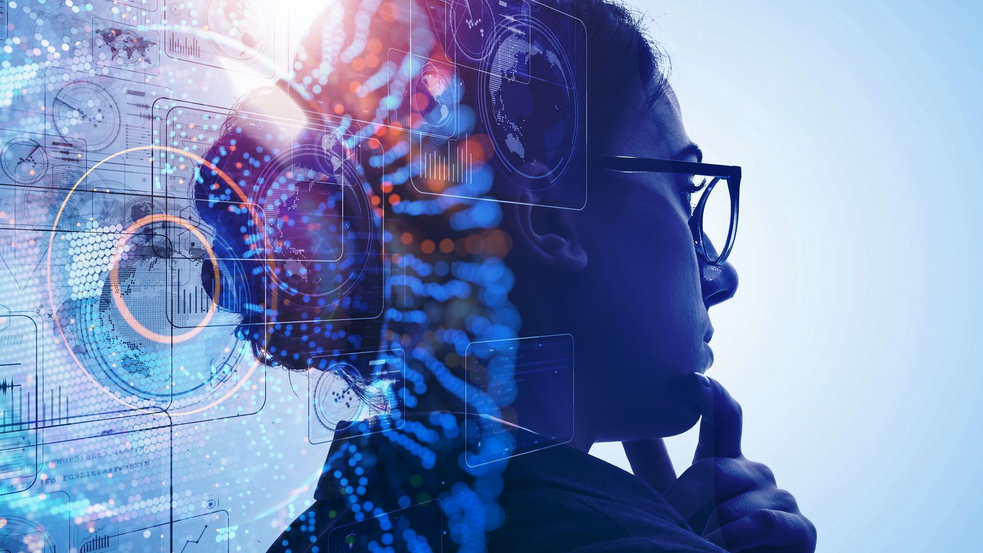 Profile of a person with glowing digital interface elements and a futuristic blue tech background
