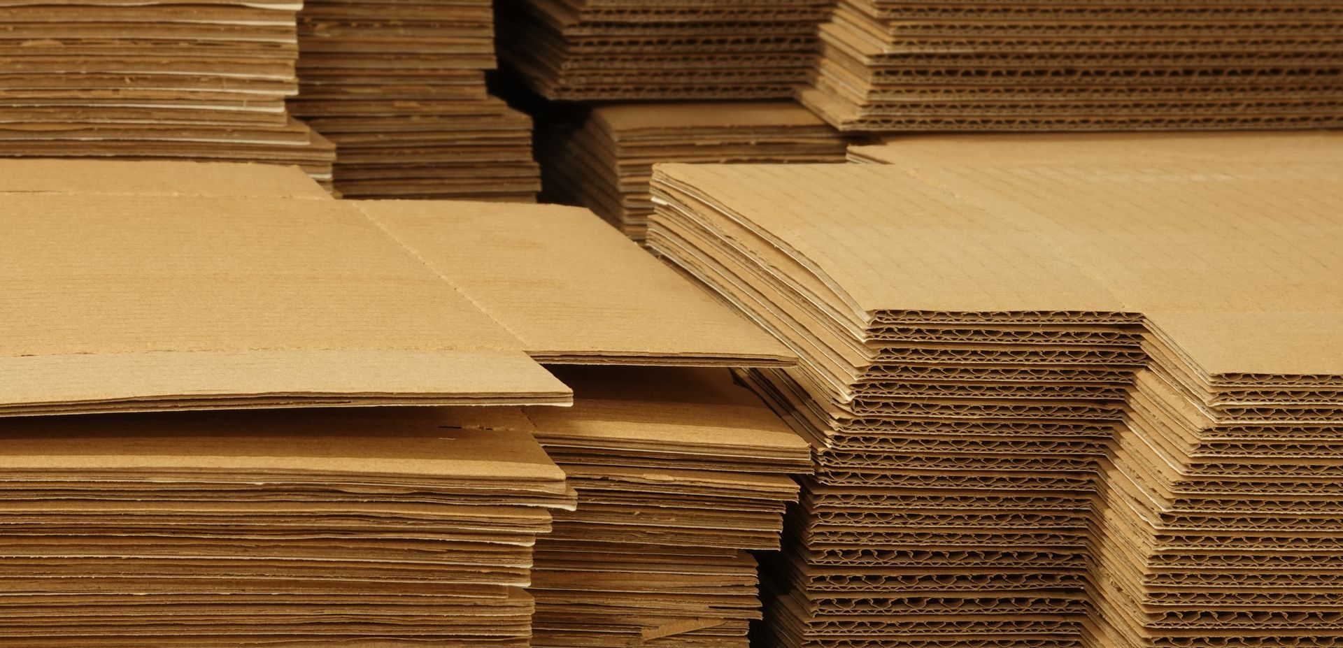A stacked sheet of brown corrugated fibreboards.