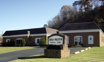 Brick building with sign reading 