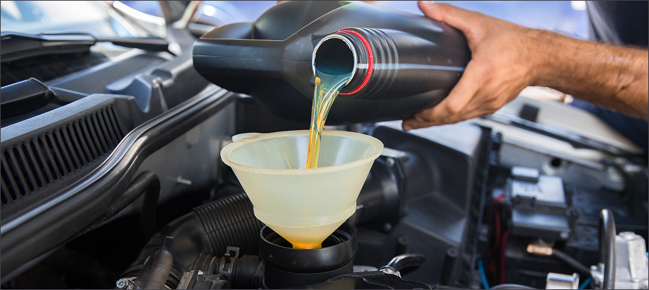 Pouring motor oil 